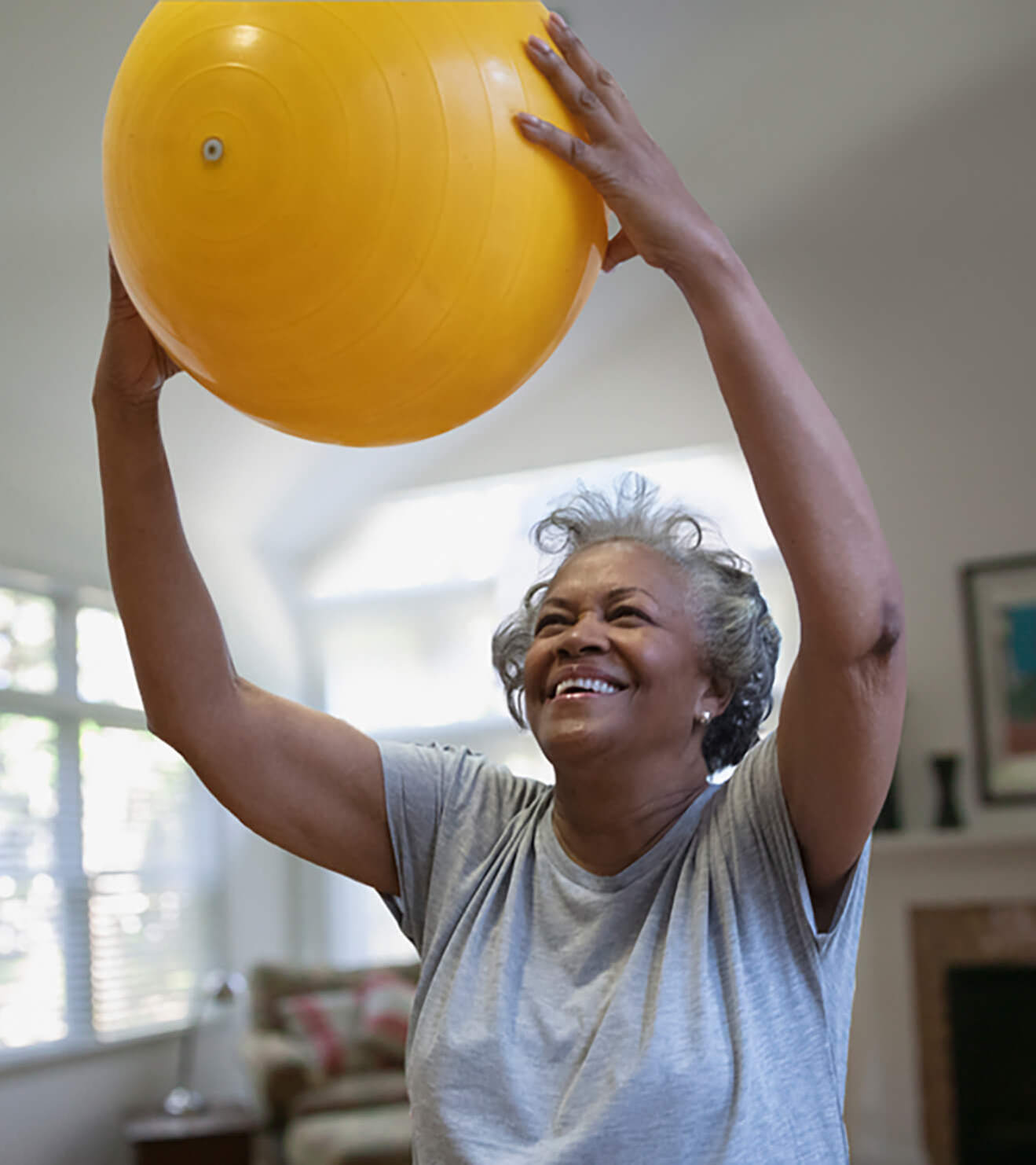 senior woman with an excercise ball